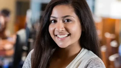 Smiling girl excited about study abroad.